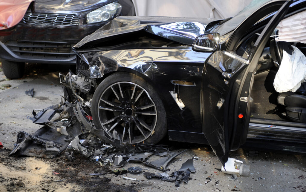 Two damaged cars in a car accident in El Paso.